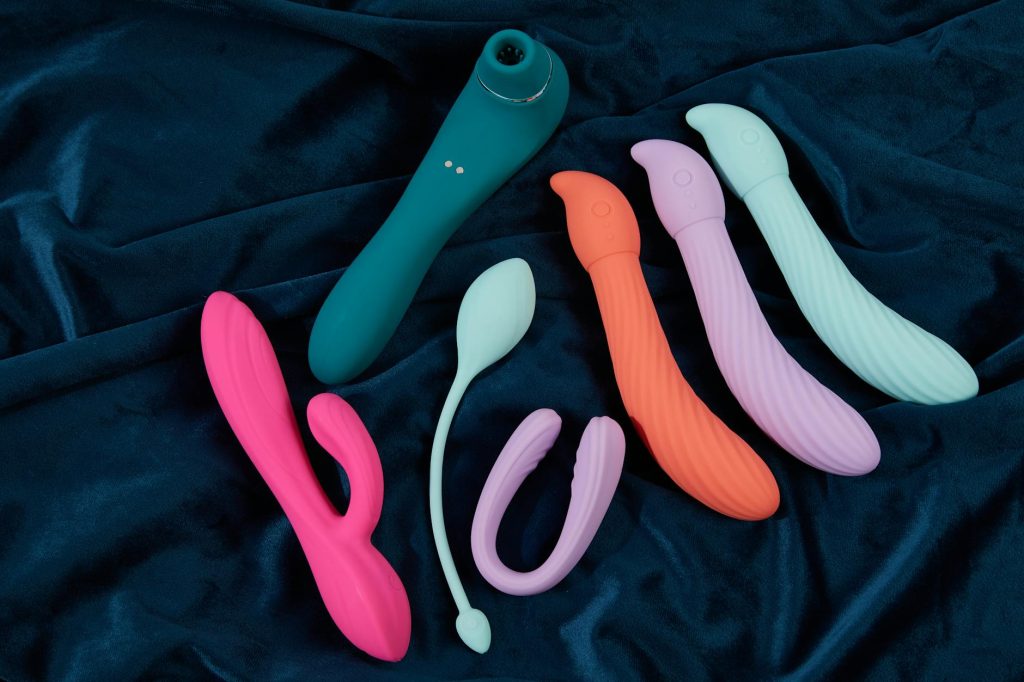 sex toys on a blue fabric